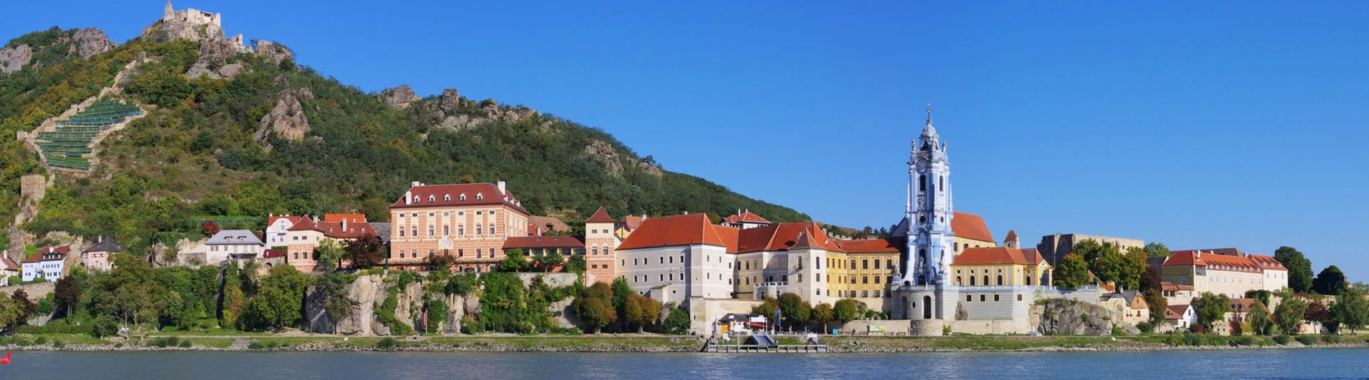 A modern Danube river cruise ship with a sun deck